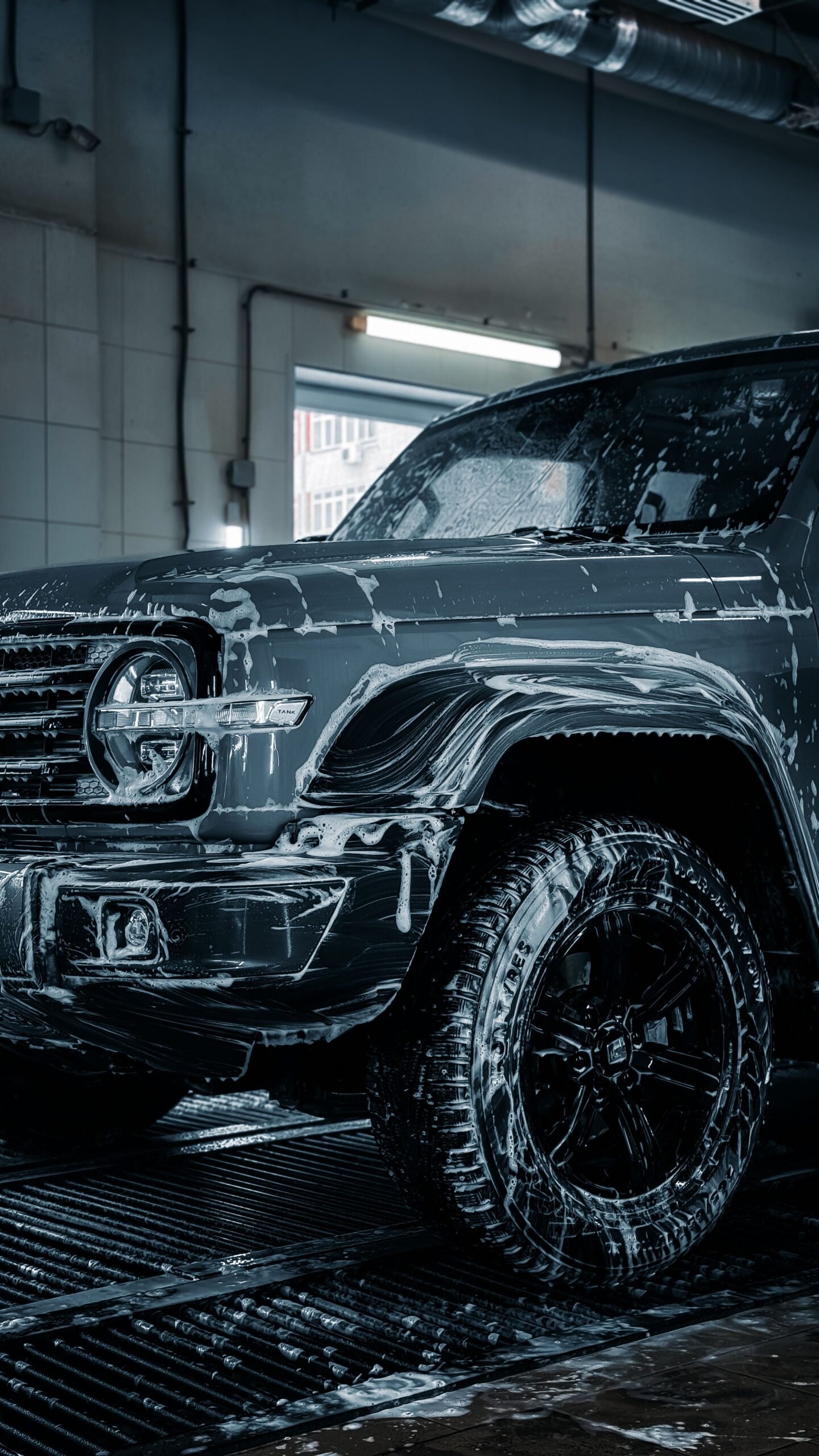 Vehicle covered in foam during a protection service
